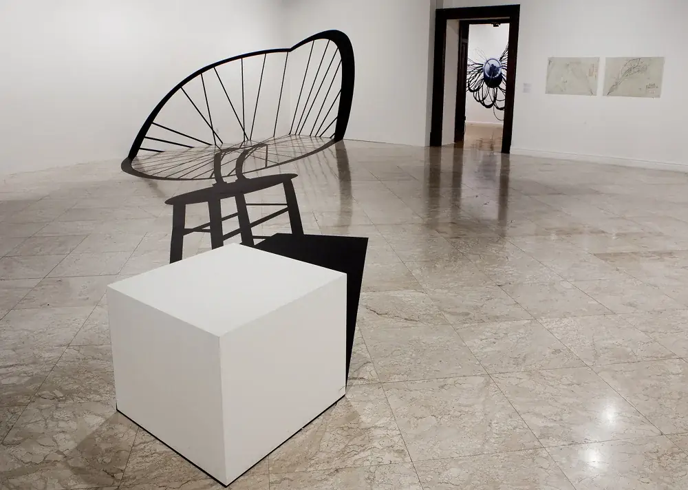 Masterpieces (In Absentia): Meret Oppenheim, 2012 — Adhesive vinyl and wooden pedestal