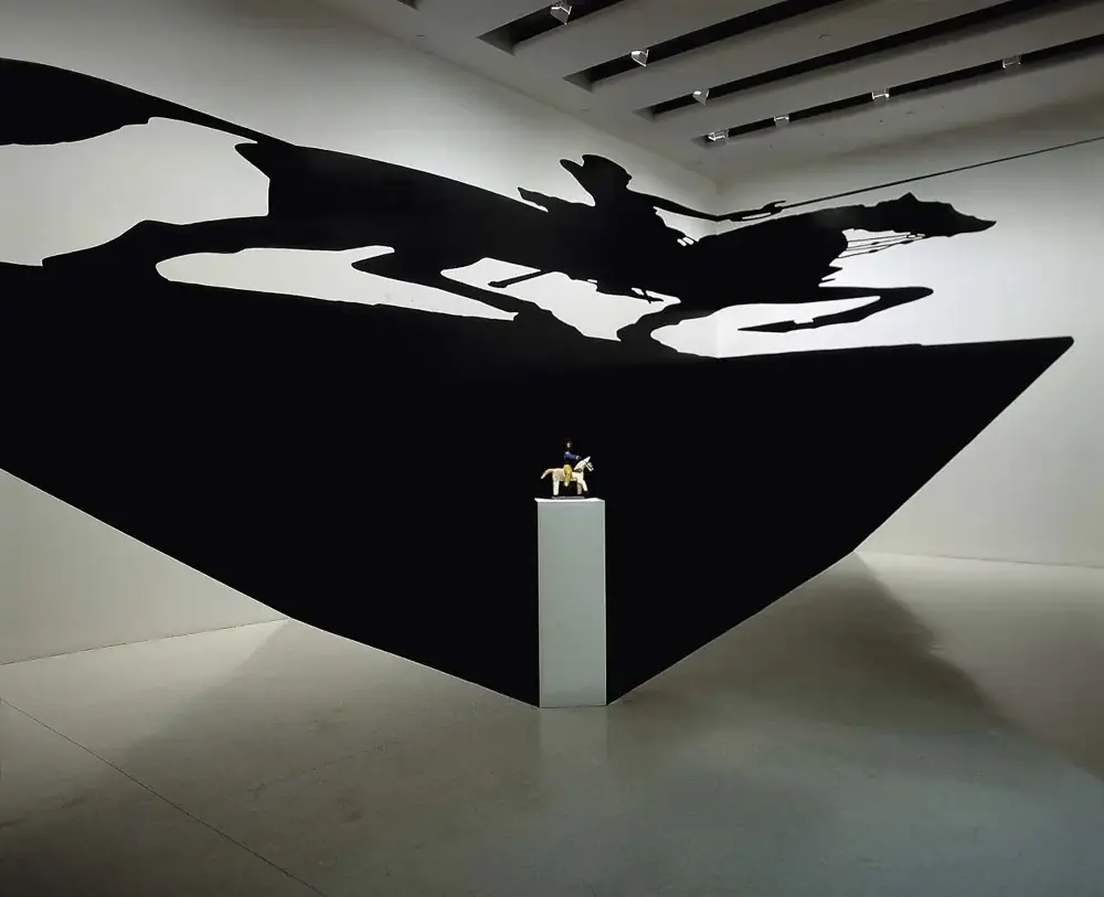 O Paradoxo do Santo, 2021 — Adhesive vinyl and base with wooden saint